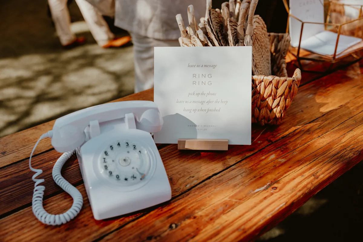 The vintage rotary phone audio guest book set up at a wedding reception
