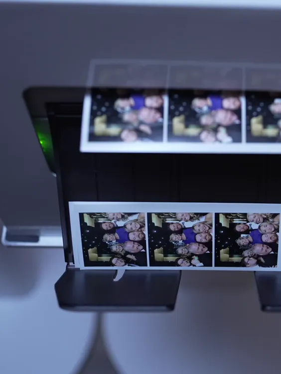 Film strips printing from the photo booth printer
