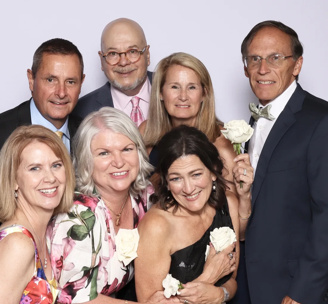 A family group posing together in the Viva Booth Co. photo booth